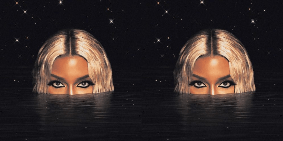 Victoria Monét's Jaguar II album cover, featuring Monét coming out of inky black water.