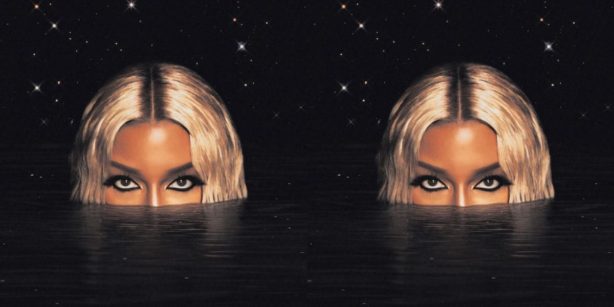 Victoria Monét's Jaguar II album cover, featuring Monét coming out of inky black water.