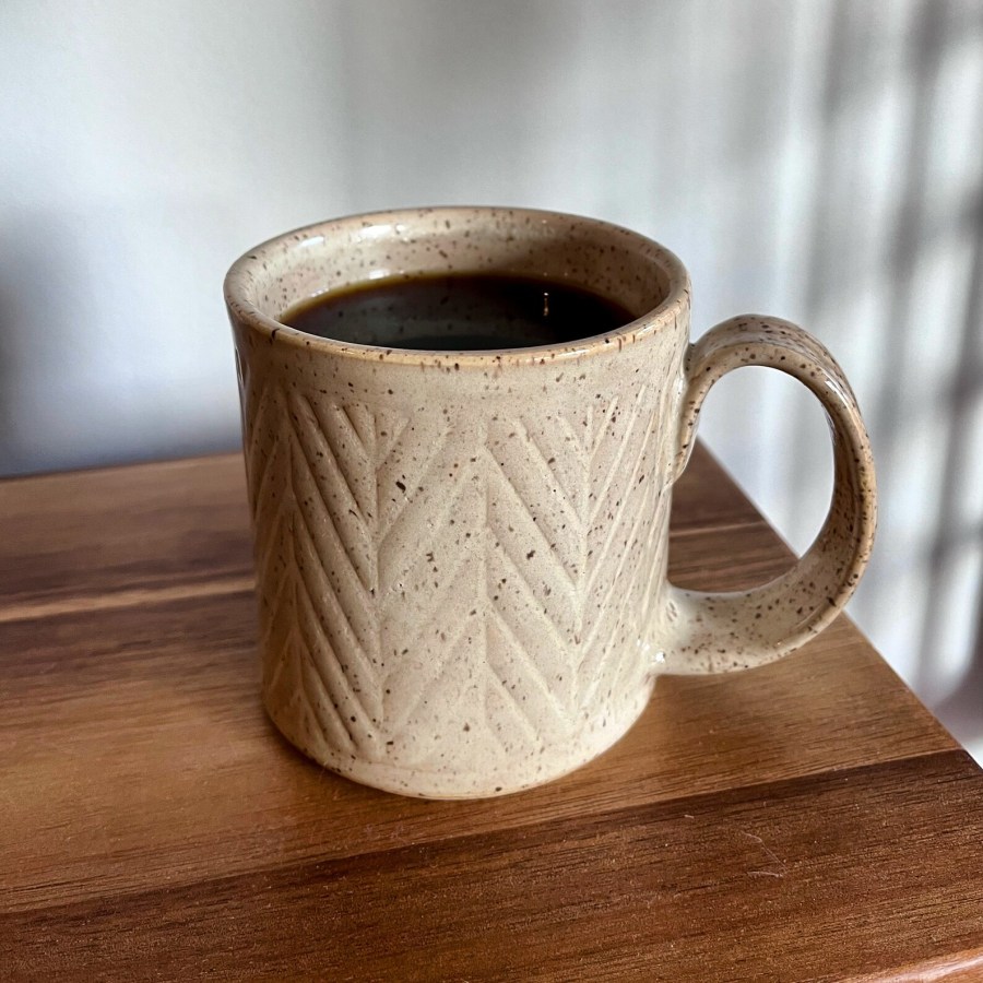 off white textured ceramic mug