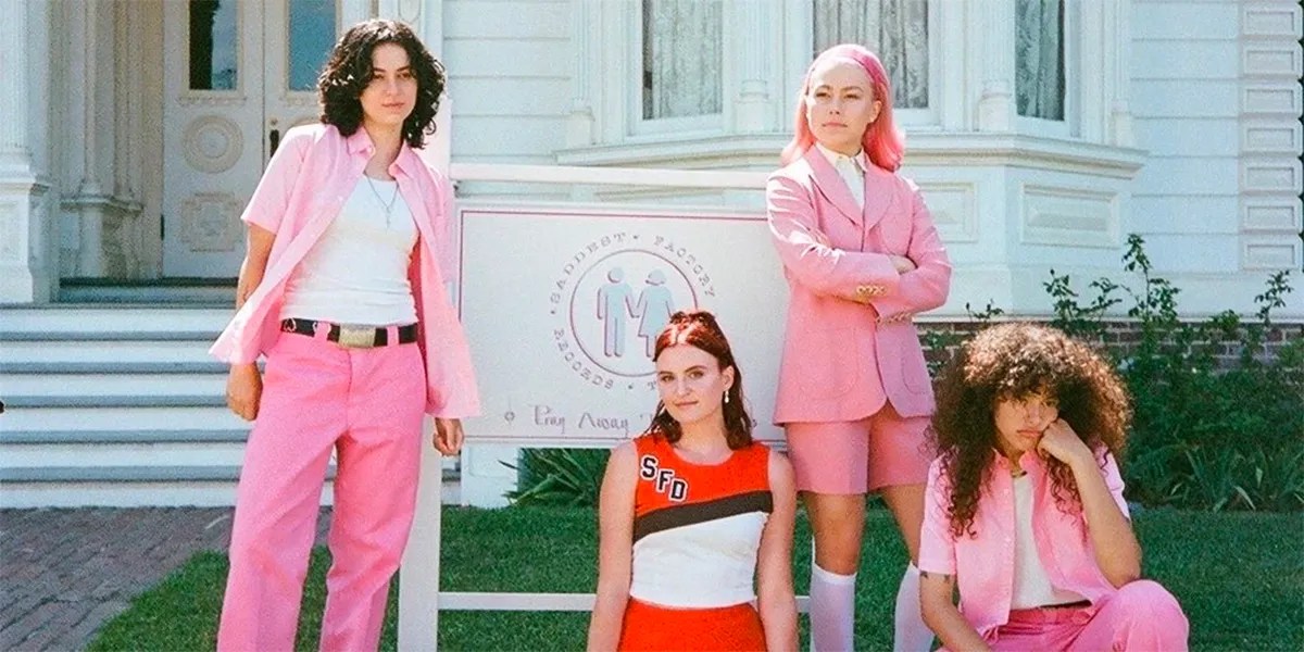 MUNA and Phoebe Bridgers in the cheerleading-themed music video for Silk Chiffon