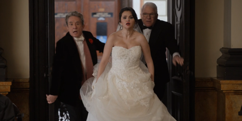 Mabel bursts into the courtroom with a wedding dress on