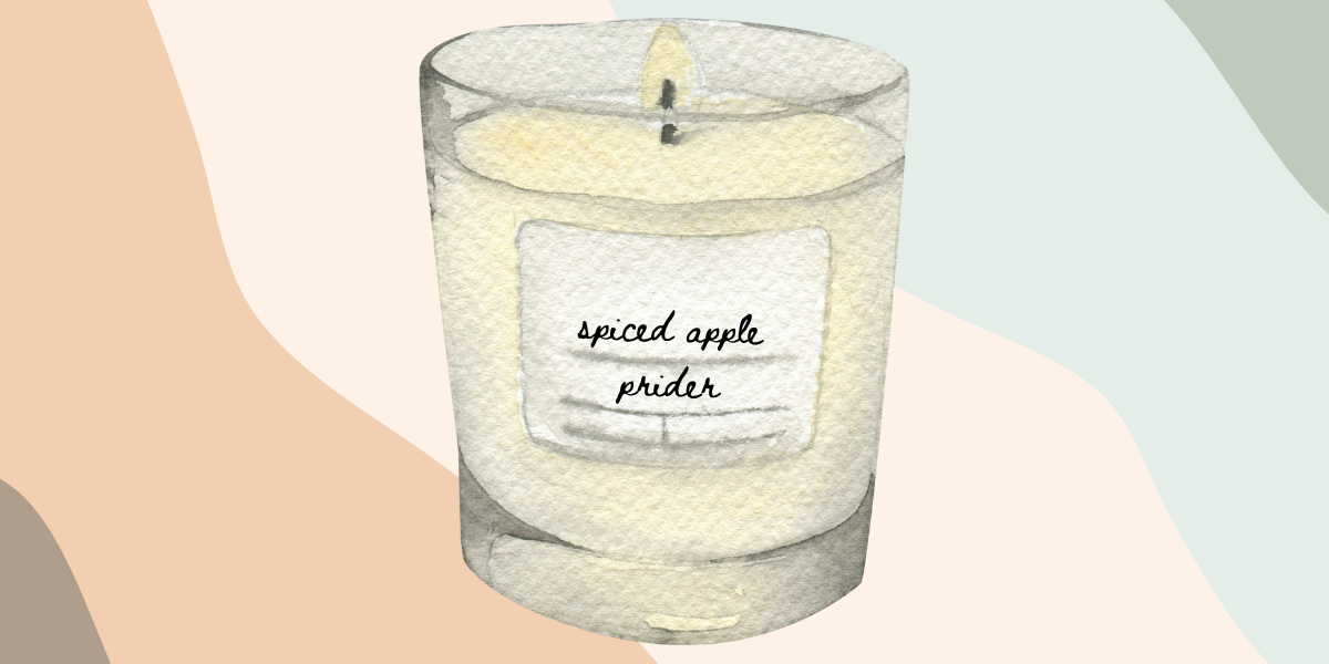 a candle labeled spiced apple prider