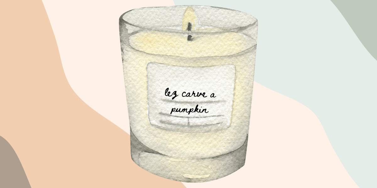 a candle labeled lez carve a pumpkin