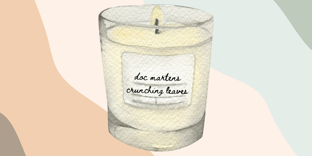 a candle labeled doc martens crunching leaves