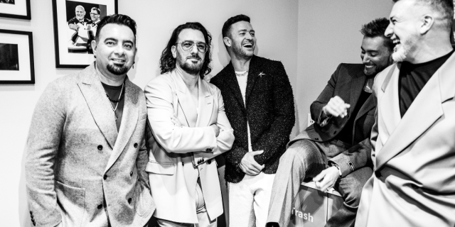 in black and white, the members of NSYNC backstage at the VMA awards 2023