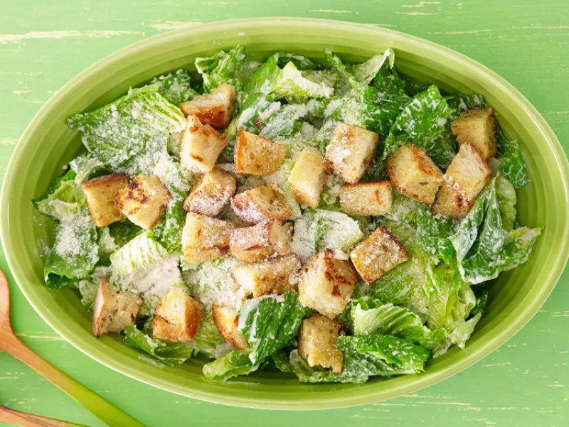 a plate of caesar salad