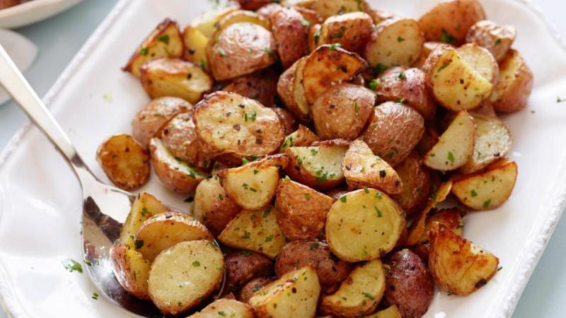 a plate of roasted garlic potatoes