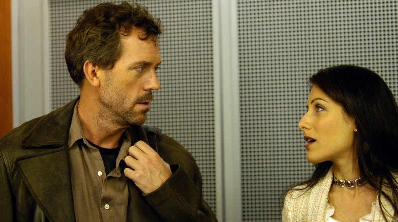 House and Cuddy look at each other as they talk