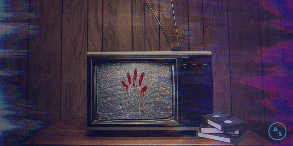 a staticky television with a bloody handprint on it and a stack of VHSs next to it with a blue AS logo