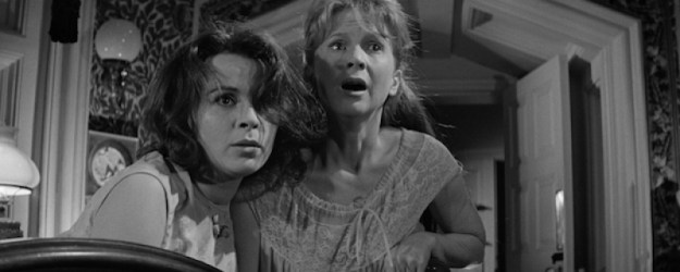 Theodora and Nell in The Haunting 1963 look in horror at something
