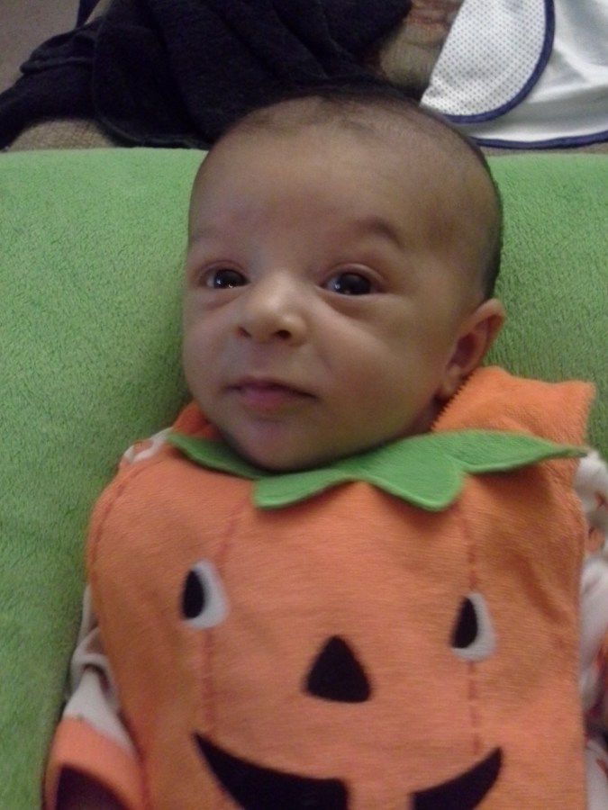 The author's son as a baby, dressed as a pumpkin