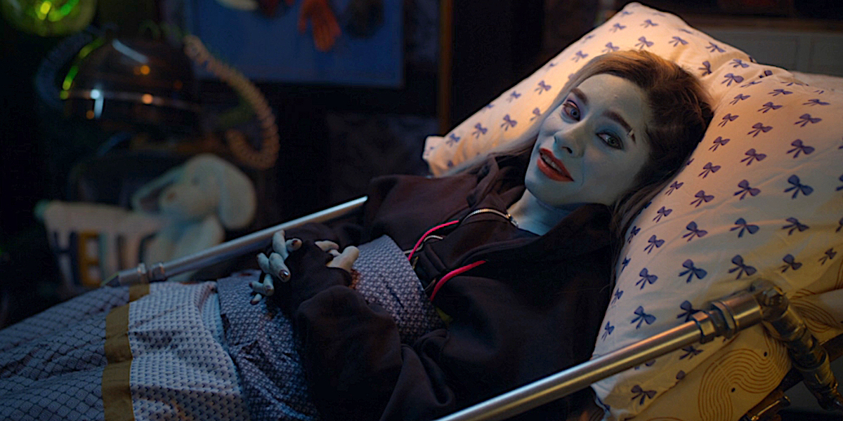 Monster High 2: Frankie lies in their bed, smiling