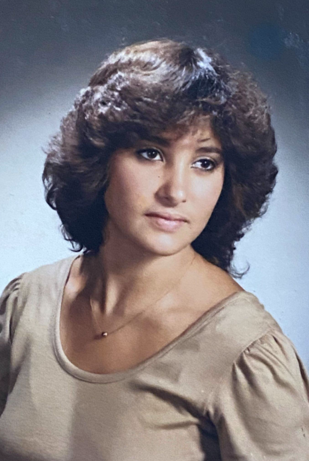 a school portrait of the author's mother at 16