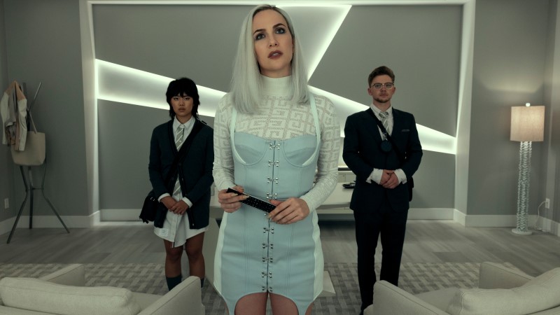 The Fall of the House of Usher: Kate Siegel as Camille with her two assistants standing behind her 