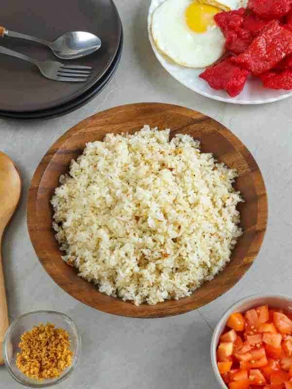 a plate of garlic fried rice