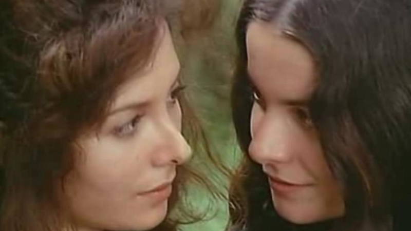 two women's faces are close in the lesbian vampire movie Alucarda