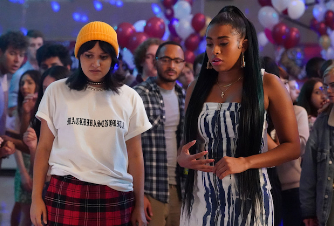 two teenagers at a school dance