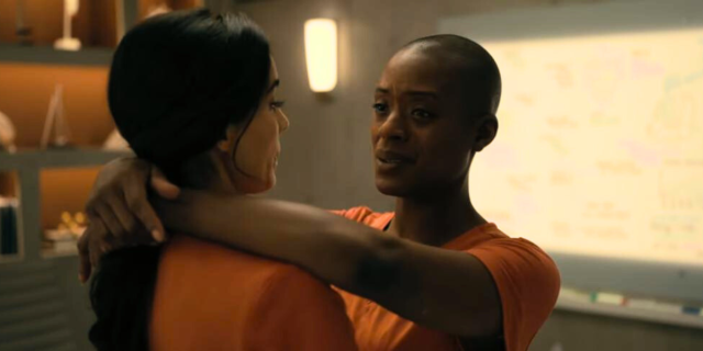 Victorine and Alessandra embrace in orange scrubs in The Fall of the House of Usher episode one