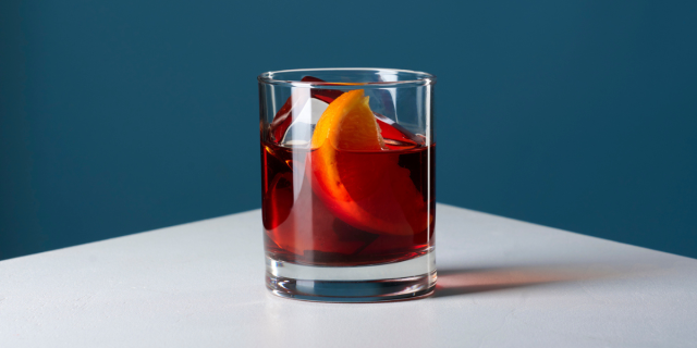 a glass of negroni, made with vermouth