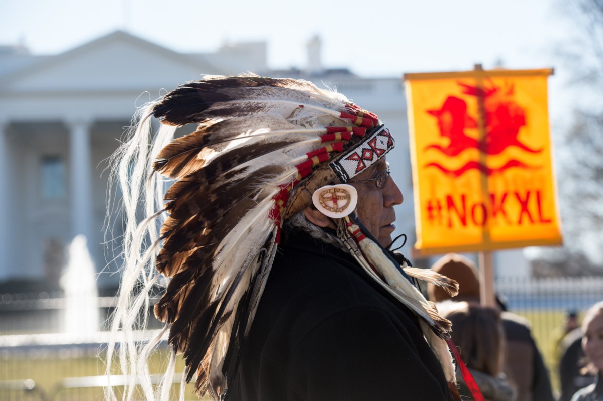 Lakota spiritual leader Chief Arvol Looking Horse attends a demonstration against the proposed Keystone XL pipeline from Canada to the Gulf of Mexico in front of the White House in Washington, DC, on January 28, 2015.   AFP PHOTO/NICHOLAS KAMM   