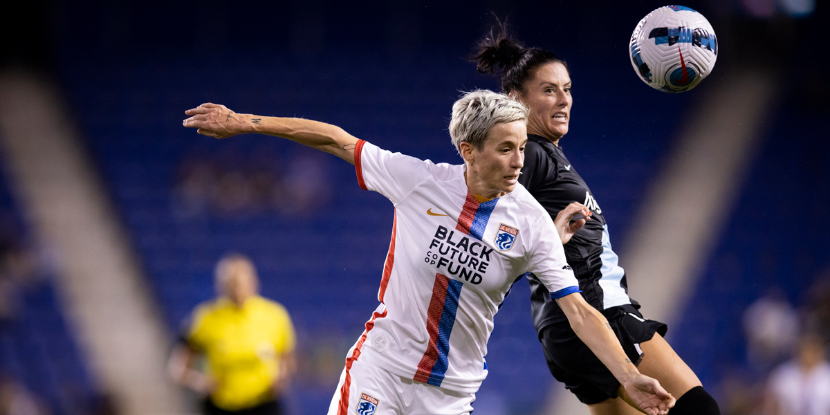 NWSL Championship preview: Megan Rapinoe #15 of OL Reign and Ali Krieger #11 of NJ/NY Gotham FC go up for the header