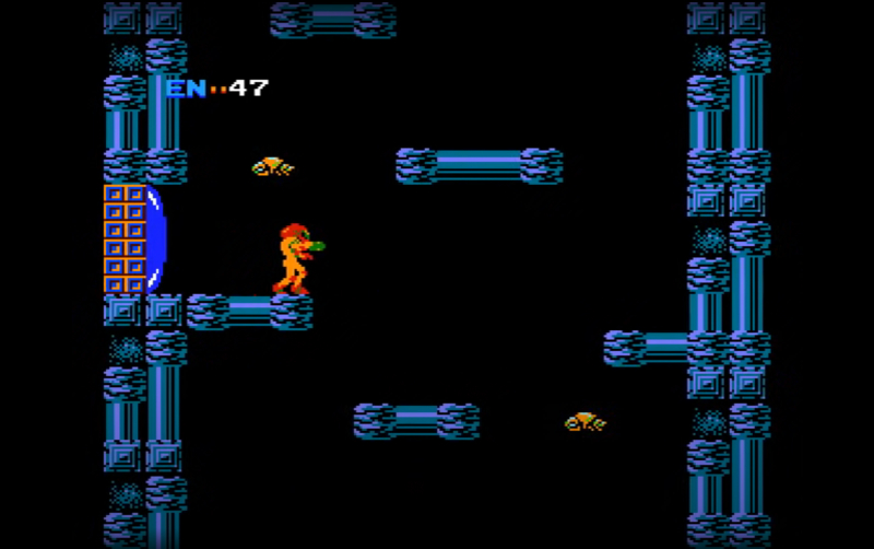 Metroid stands on a platform and points their gun.