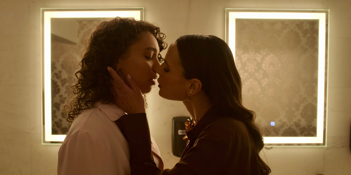 In Neon on Netflix, Gina and Ness kiss in the bathroom