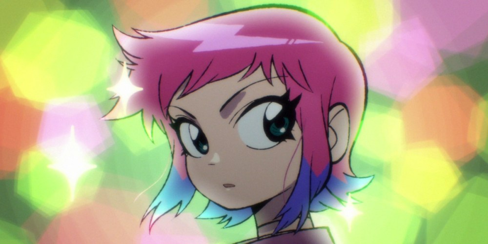 Ramona Flowers looks over her shoulder, the background full of sparkles and glitter
