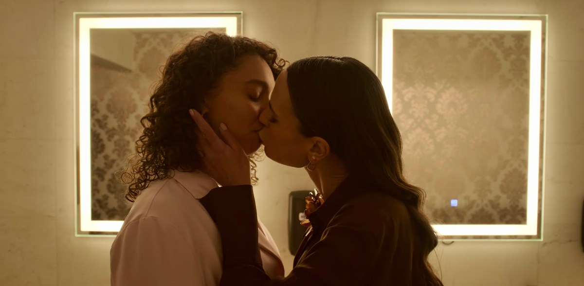 In Neon on Netflix, Gina and Ness kiss in the bathroom