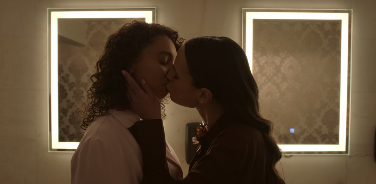 In Neon on Netflix, Gina and Ness kiss in the bathroom