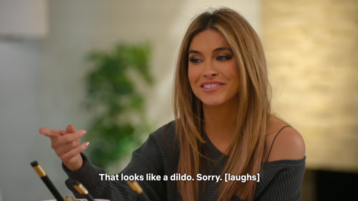 Chrishell Stause, a real estate agent on Netflix’s Selling Sunset, points out that the dumplings her friends Emma Hernan and Chelsea Lakzani are making look like dildos