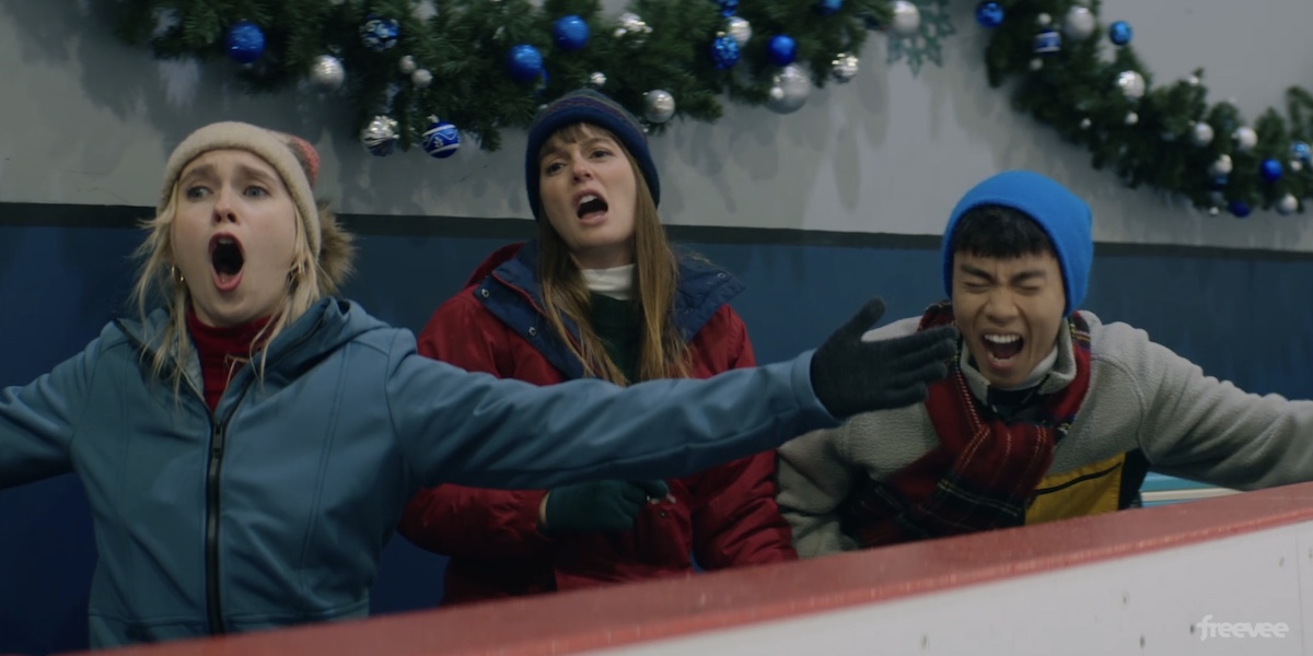 Mindy, Ali and Elliot yelling from the sidelines