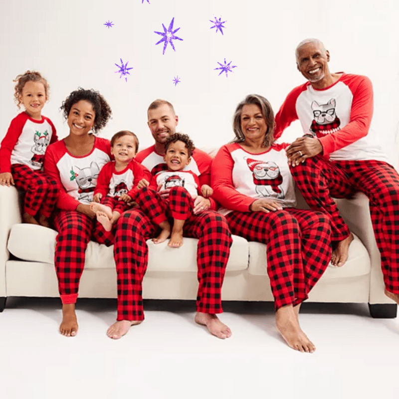 a large family wearing matching Frenchie Christmas pajamas
