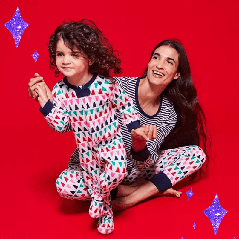 a mother and toddler with matching geometric color pajama sets