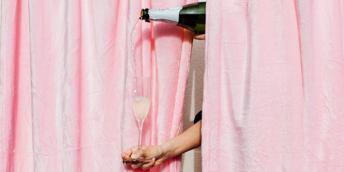 sparkling wine being poured into a champagne flute