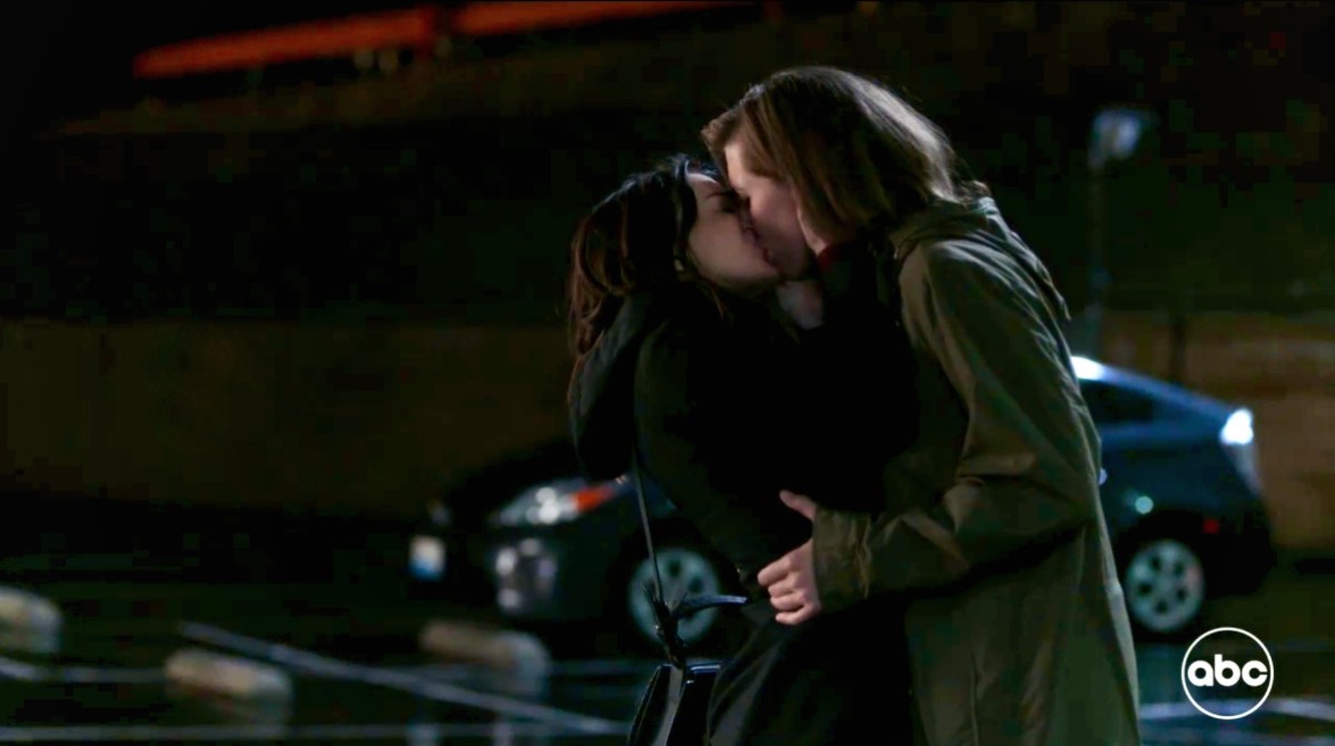 Kai and Amelia kiss in a medium wide on Grey's Anatomy 
