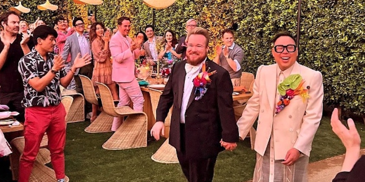 zeke smith and nico santos walking down the aisle