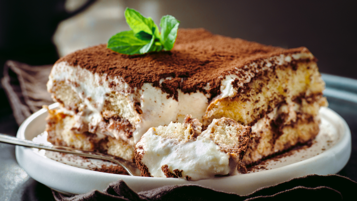 A close up of a piece of tiramisu 