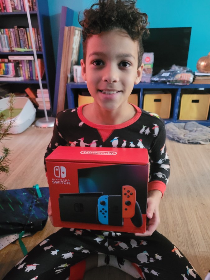 the author's young son with a Nintendo Switch