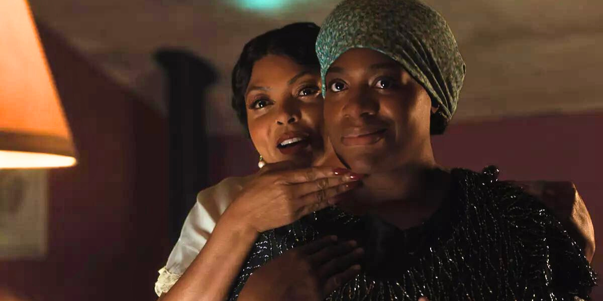 Shug and Celie gaze at each other in the mirror in 2023's The Color Purple