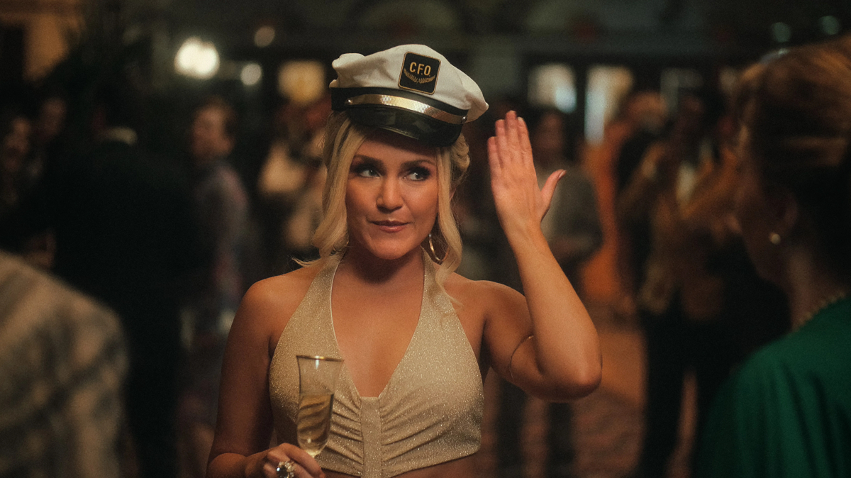 Jessica Lowe as Bambi in a sailor hat and a gold top.