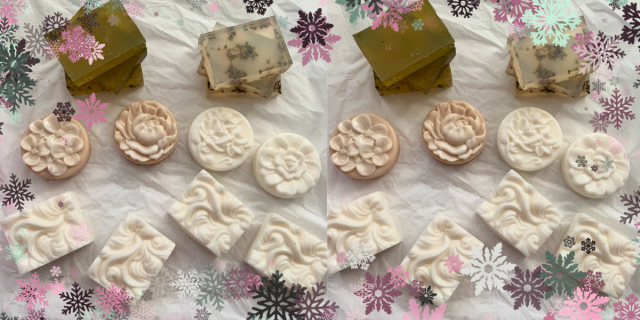 A variety of homemade soaps in neutral colors on top of white tissue paper.