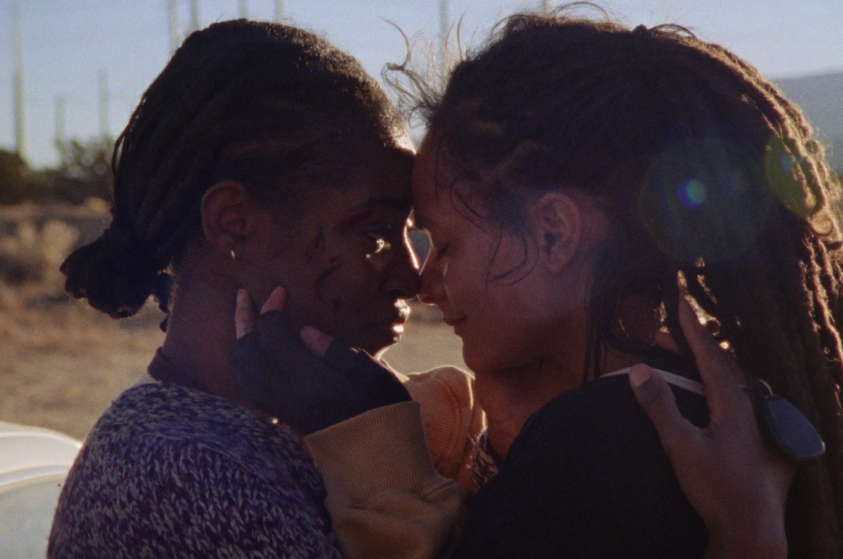 Sasha Lane and Jayme Lawson lean their heads together in an emotional moment.