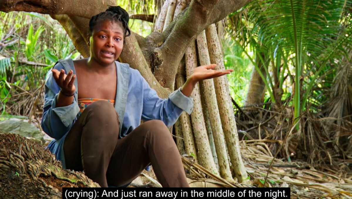 Survivor contestant Katurah Topps cries while explaining to the camera, in a confessional interview, the night that her family ran away from their religious cult.