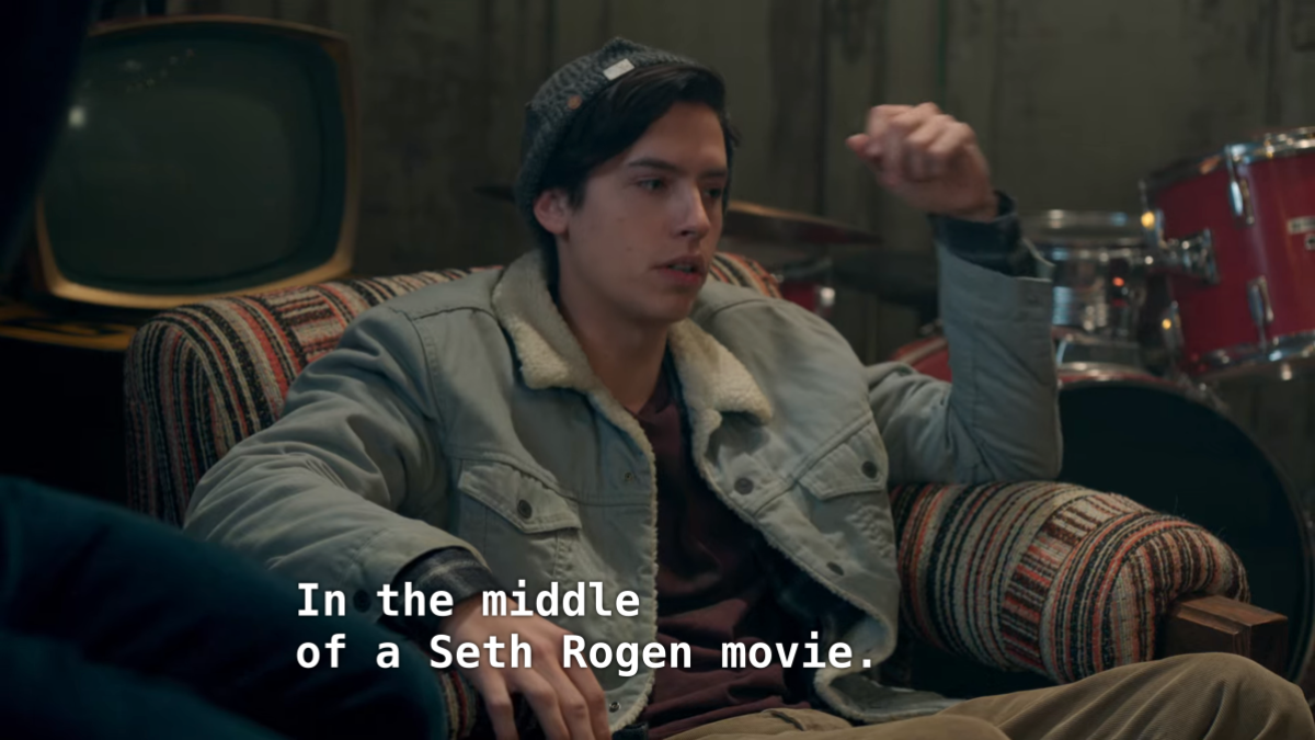 Jughead sits in a chair. Jughead: In the middle of a Seth Rogen movie.