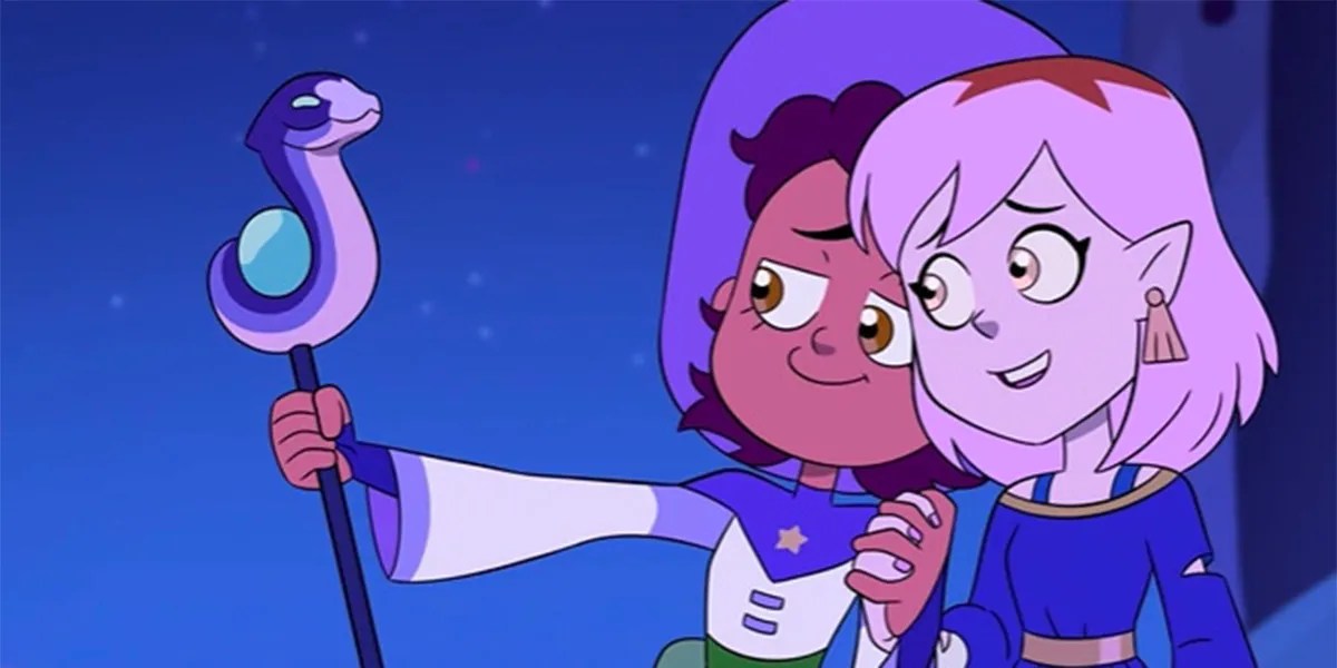 Two cartoon characters of different shades of purple hold hands and lean their heads together as they admire a serpentine staff.