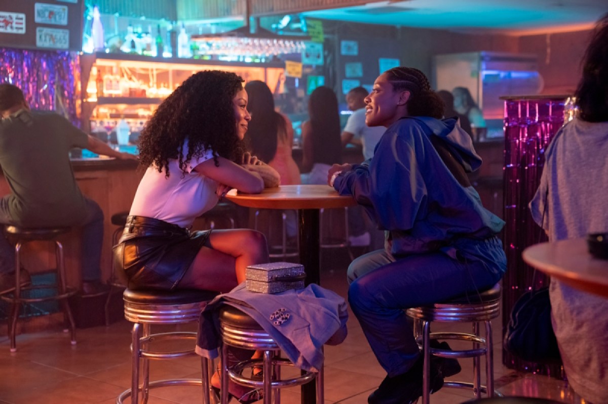 Alex and Chastity grab a drink at a Miami dive bar.