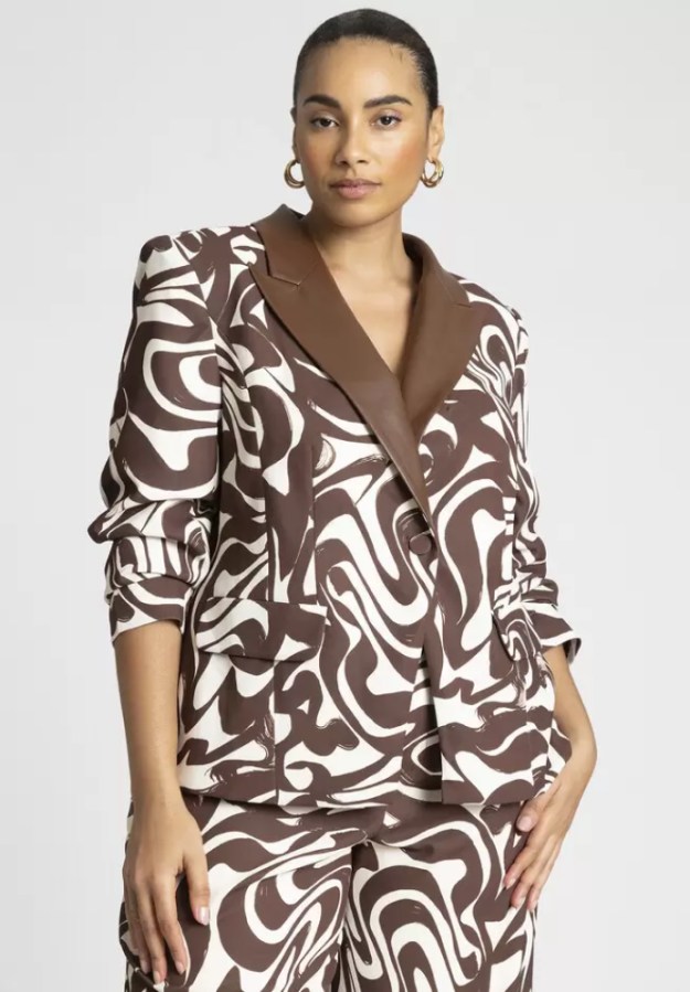 a white and brown swirl pattern pleather blazer