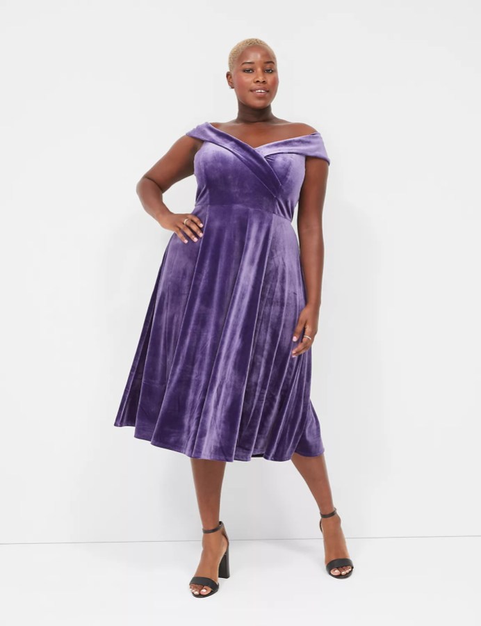 a purple velvet off the shoulder flowy dress