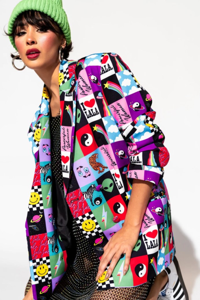 plus size wedding guest inspiration: a patterned gay blazer in bold colors and print